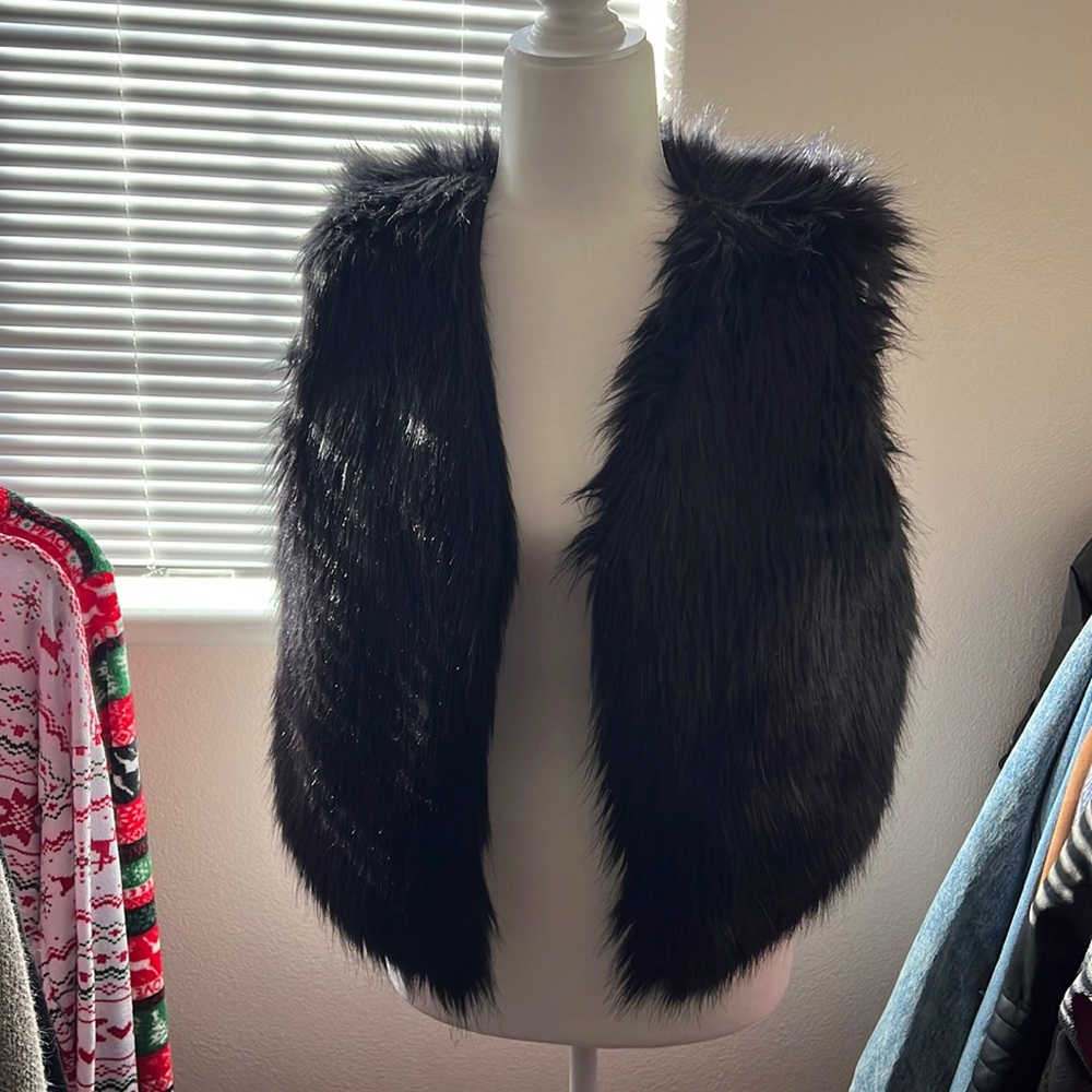 Black faux fur vest